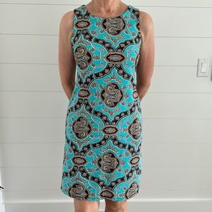 Jude Connally Beth sleeveless dress in aqua and brown pattern.